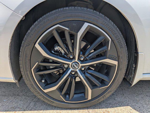 Photo of 2024 Pearl White Tricoat Nissan Altima