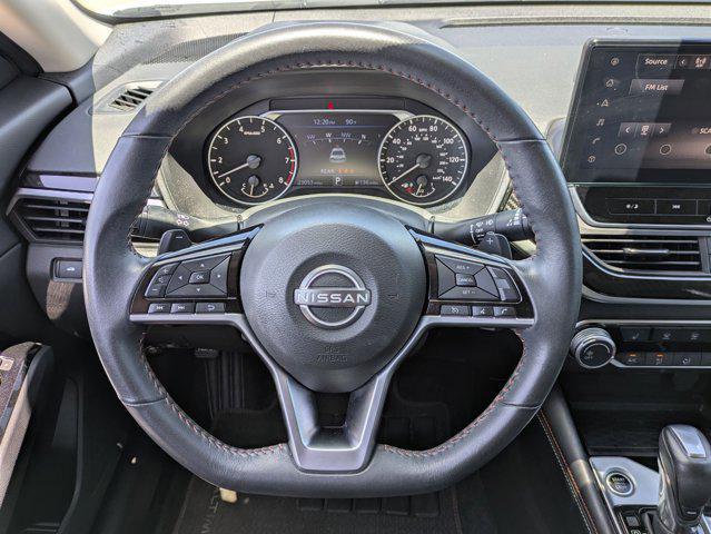 Photo of 2024 Pearl White Tricoat Nissan Altima
