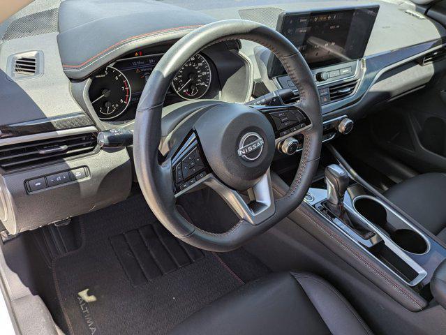 Photo of 2024 Pearl White Tricoat Nissan Altima