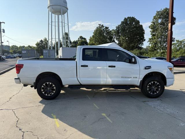 Photo of 2023 Glacier White Nissan Titan XD