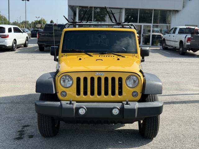 Photo of 2015 Baja Yellow Clearcoat Jeep Wrangler Unlimited