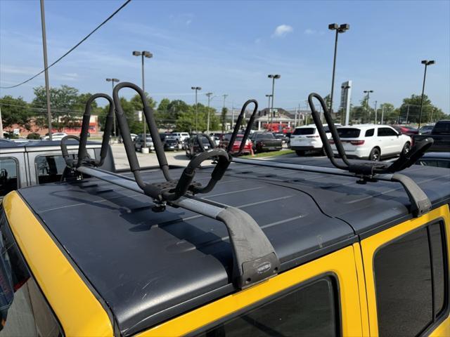 Photo of 2015 Baja Yellow Clearcoat Jeep Wrangler Unlimited