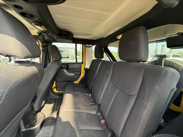Photo of 2015 Baja Yellow Clearcoat Jeep Wrangler Unlimited