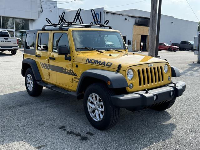 Photo of 2015 Baja Yellow Clearcoat Jeep Wrangler Unlimited