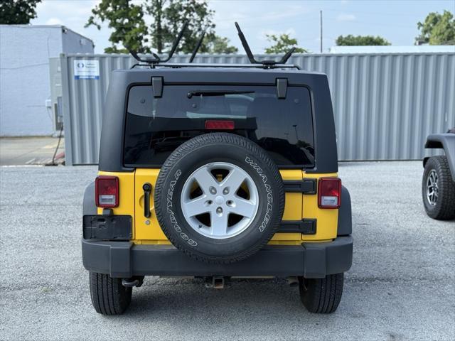 Photo of 2015 Baja Yellow Clearcoat Jeep Wrangler Unlimited