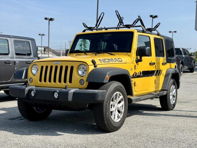 Photo of 2015 Baja Yellow Clearcoat Jeep Wrangler Unlimited