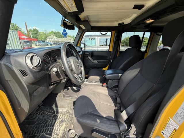Photo of 2015 Baja Yellow Clearcoat Jeep Wrangler Unlimited