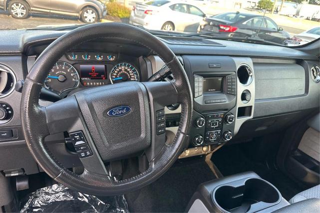 Photo of 2014 Tuxedo Black Metallic Ford F-150