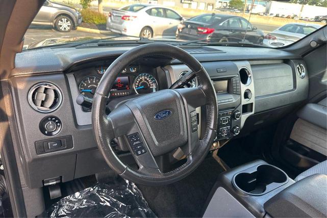Photo of 2014 Tuxedo Black Metallic Ford F-150