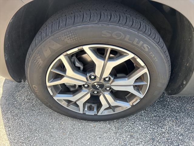 Photo of 2023 Cherry Black Kia Seltos