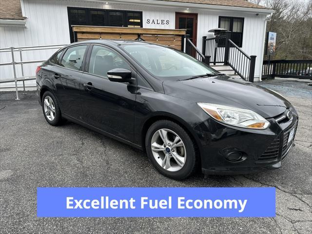 Photo of 2014 Tuxedo Black Metallic Ford Focus