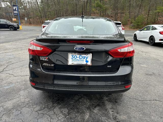 Photo of 2014 Tuxedo Black Metallic Ford Focus