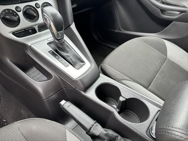 Photo of 2014 Tuxedo Black Metallic Ford Focus