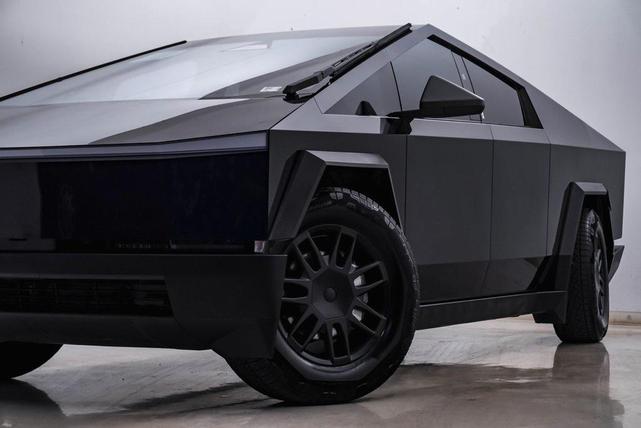 Photo of 2024 (WRAPPED IN DARK PURPLE ) Tesla Cybertruck