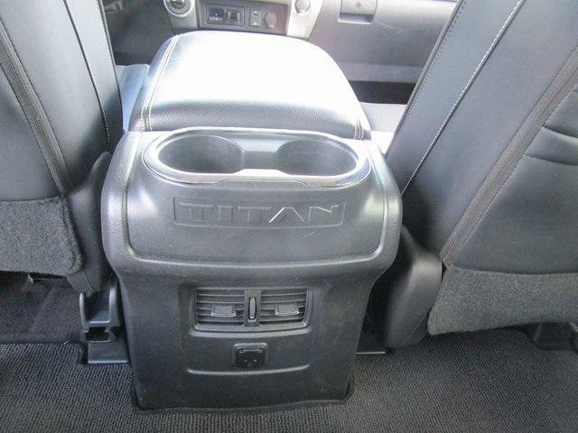 Photo of 2017 Magnetic Black Nissan Titan XD