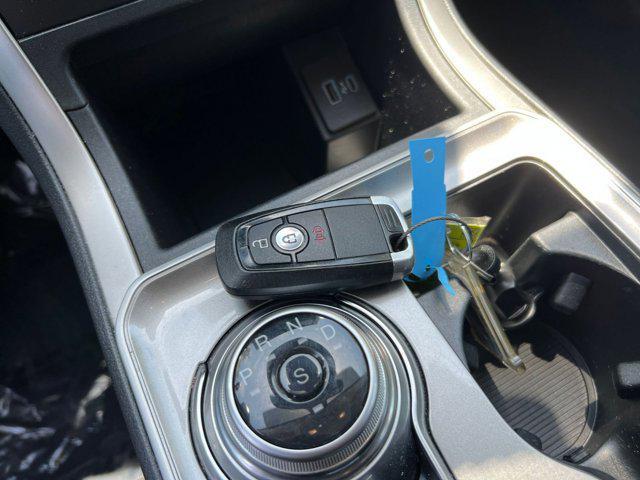 Photo of 2024 Agate Black Metallic Ford Edge