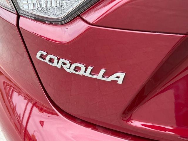 Photo of 2025 Ruby Toyota Corolla Hybrid