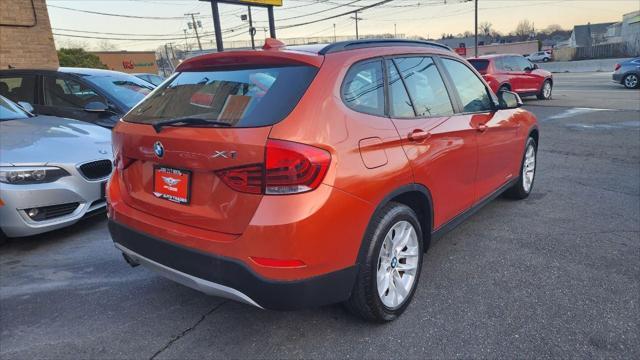 Photo of 2015 Valencia Orange Metallic BMW X1
