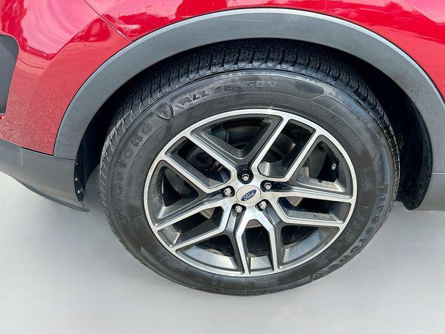 Photo of 2016 Ruby Red Metallic Tinted Clearcoat Ford Explorer