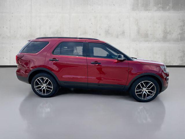 Photo of 2016 Ruby Red Metallic Tinted Clearcoat Ford Explorer