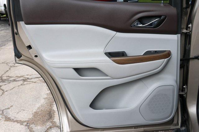 Photo of 2023 Light Stone Metallic GMC Acadia