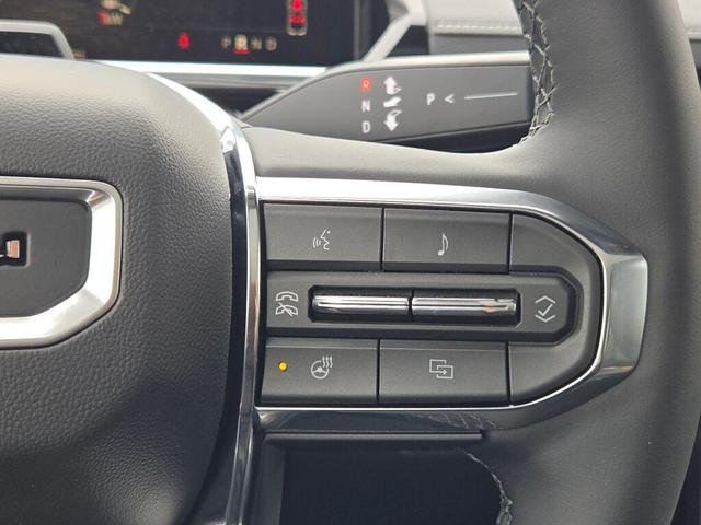Photo of 2025 Summit White GMC Sierra EV