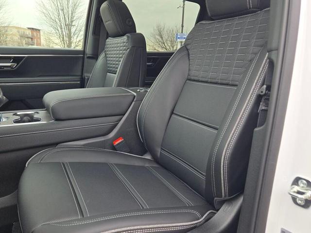 Photo of 2025 Summit White GMC Sierra EV