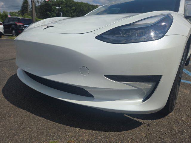 Photo of 2023 Pearl White Multi-Coat Tesla Model 3