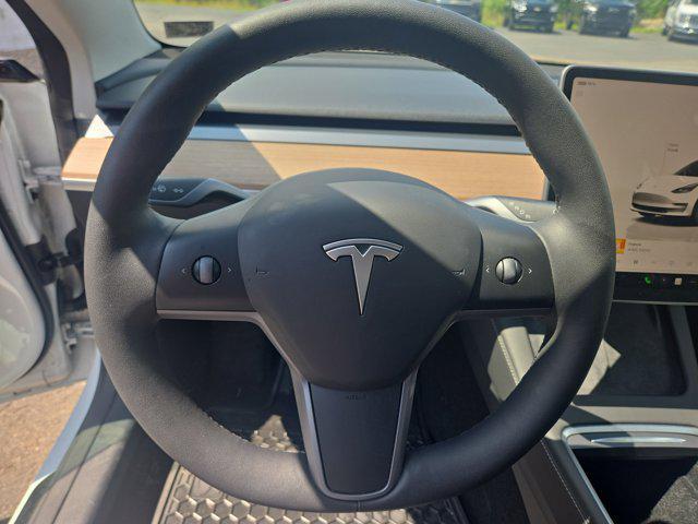 Photo of 2023 Pearl White Multi-Coat Tesla Model 3