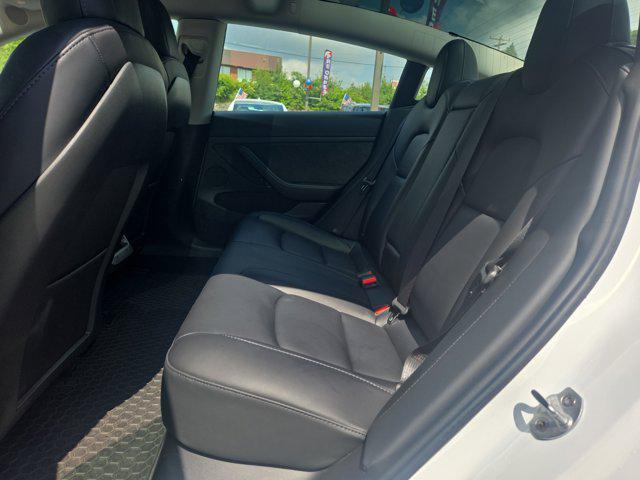 Photo of 2023 Pearl White Multi-Coat Tesla Model 3