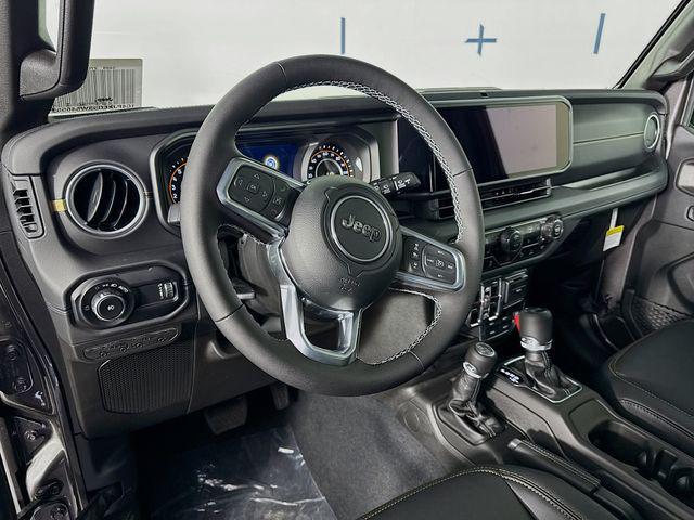 Photo of 2025 Granite Crystal Metallic Clearcoat Jeep Wrangler
