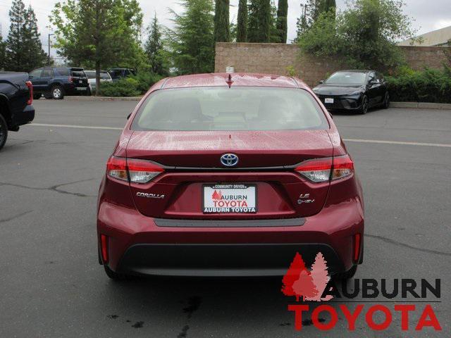 Photo of 2025 Ruby Flare Pearl Toyota Corolla Hybrid