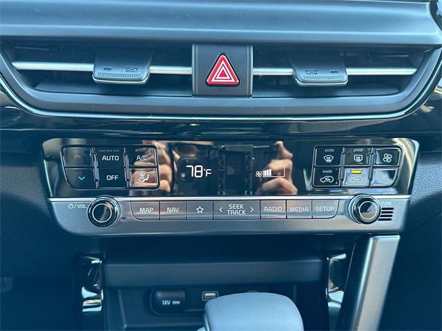 Photo of 2024 Dark Ocean Blue/White Roof Kia Seltos