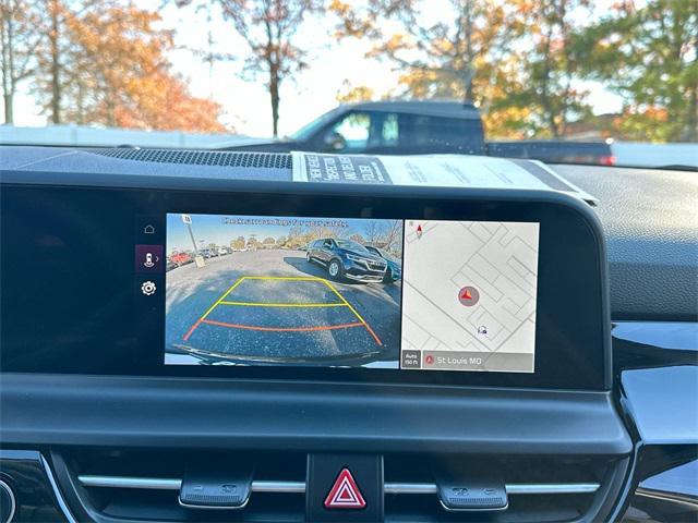 Photo of 2024 Dark Ocean Blue/White Roof Kia Seltos
