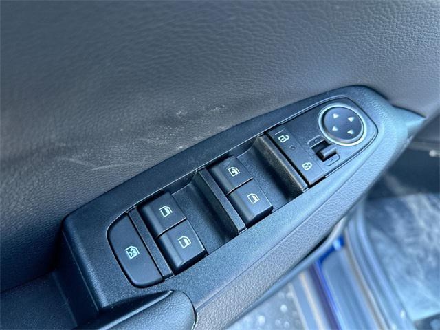Photo of 2024 Dark Ocean Blue/White Roof Kia Seltos