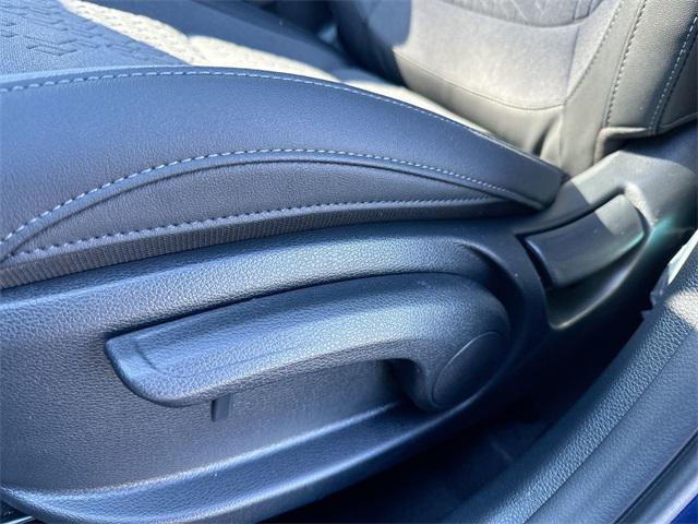 Photo of 2024 Dark Ocean Blue/White Roof Kia Seltos