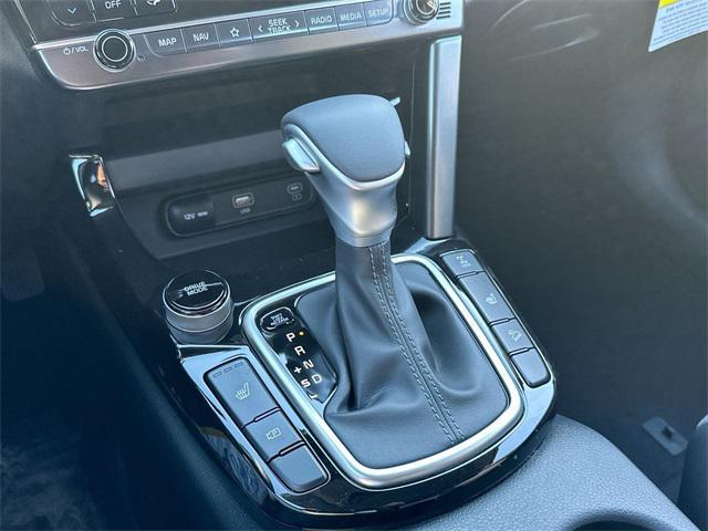 Photo of 2024 Dark Ocean Blue/White Roof Kia Seltos