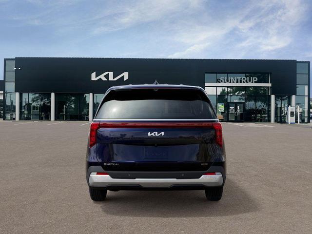 Photo of 2026 Blue Kia Carnival Hybrid