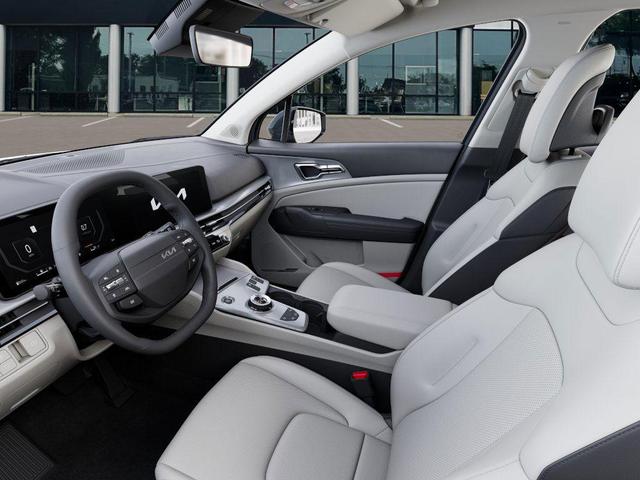 Photo of 2026 Heritage Blue Kia Sportage Hybrid
