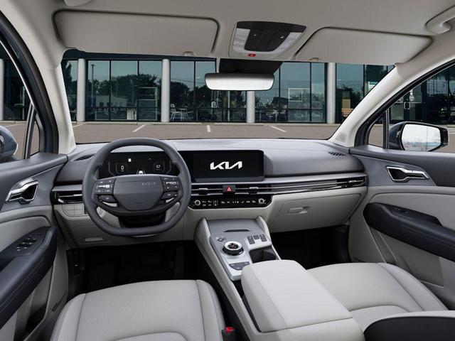 Photo of 2026 Heritage Blue Kia Sportage Hybrid