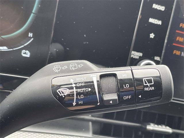 Photo of 2023 Snow White Pearl Kia Sportage Hybrid