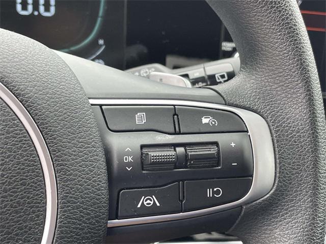 Photo of 2023 Snow White Pearl Kia Sportage Hybrid
