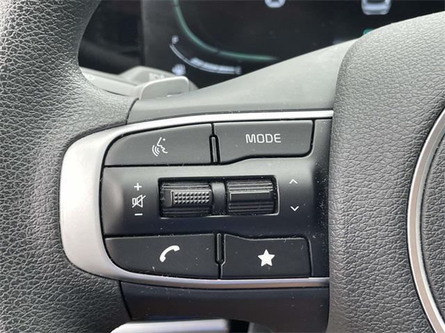Photo of 2023 Snow White Pearl Kia Sportage Hybrid