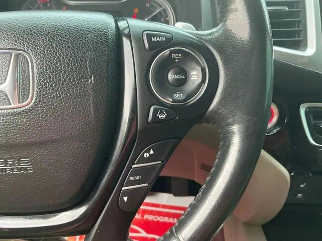 Photo of 2016 Burgundy Night Pearl Honda Pilot