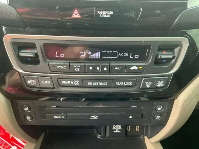 Photo of 2016 Burgundy Night Pearl Honda Pilot