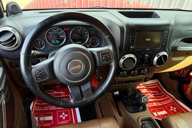 Photo of 2011 Red Jeep Wrangler Unlimited