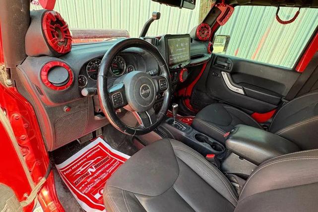 Photo of 2017 Redline Pearl Coat Jeep Wrangler Unlimited