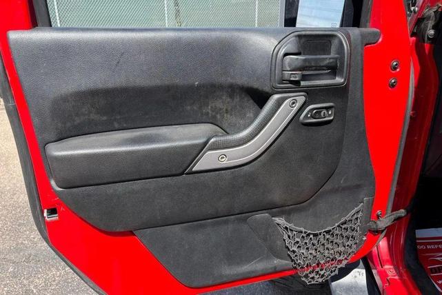 Photo of 2017 Redline Pearl Coat Jeep Wrangler Unlimited