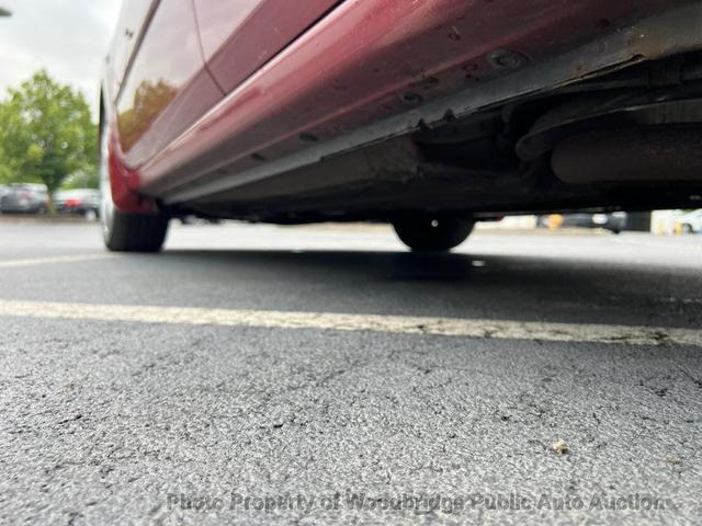 Photo of 2007 Maroon Nissan Sentra