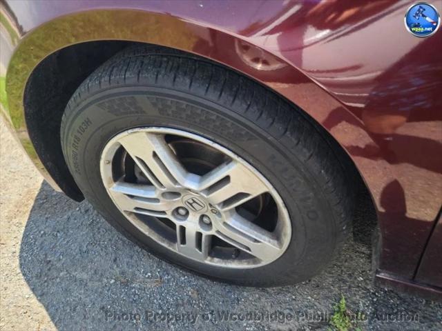 Photo of 2011 Maroon Honda Odyssey